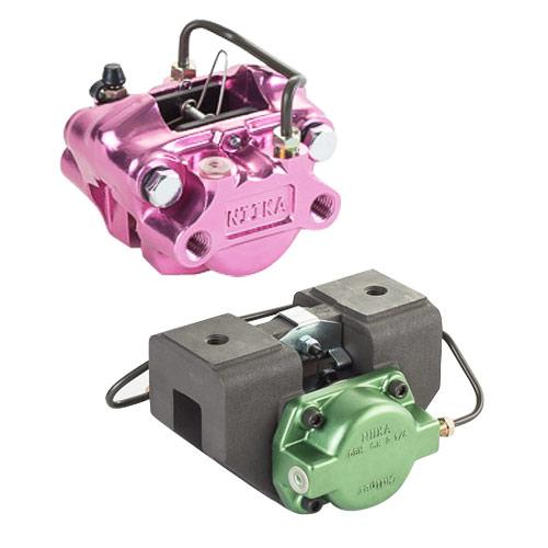 DBM and DBY air-hydraulic disc brake calipers with green and purple bodies